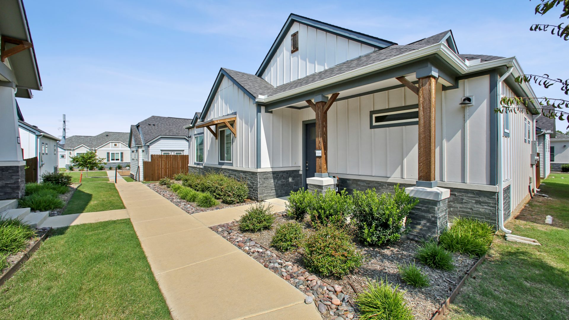Exterior view of a rental home front entrance at VLux Trails